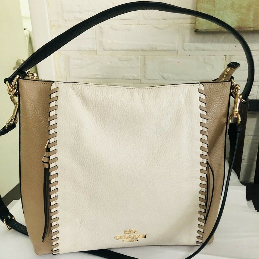 Coach Marlon with whip stitching